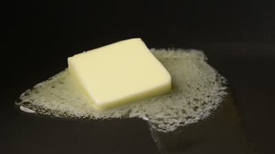 stock-footage-slowly-melting-butter-on-non-stick-pan-real-time.jpg